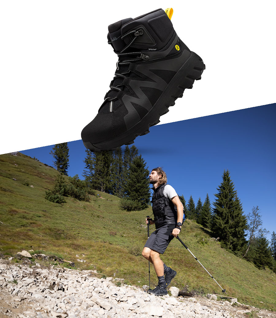 closeup des Joe Nimble Mountain Addict in Schwarz mit einem Läufer in den Bergen