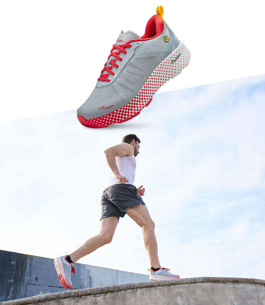 Closeup des Joe Nimble Addict Pro-R Laufschuh in grau-rot und mit Läufer in Aktion